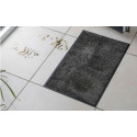 Les secrets du tapis d'entrée magique : comment il protège votre maison de l'humidité et des salissures ?